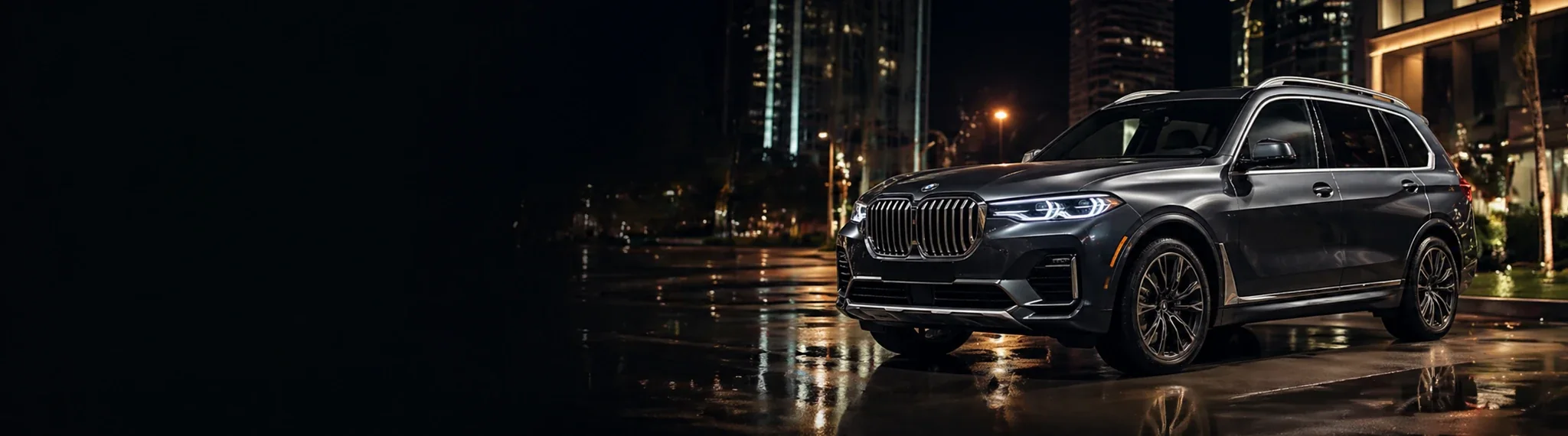 Black luxury SUV in the city at night